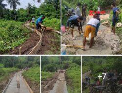 Warga Desa Malambe Swadaya Bangun Jalan Rabat Beton